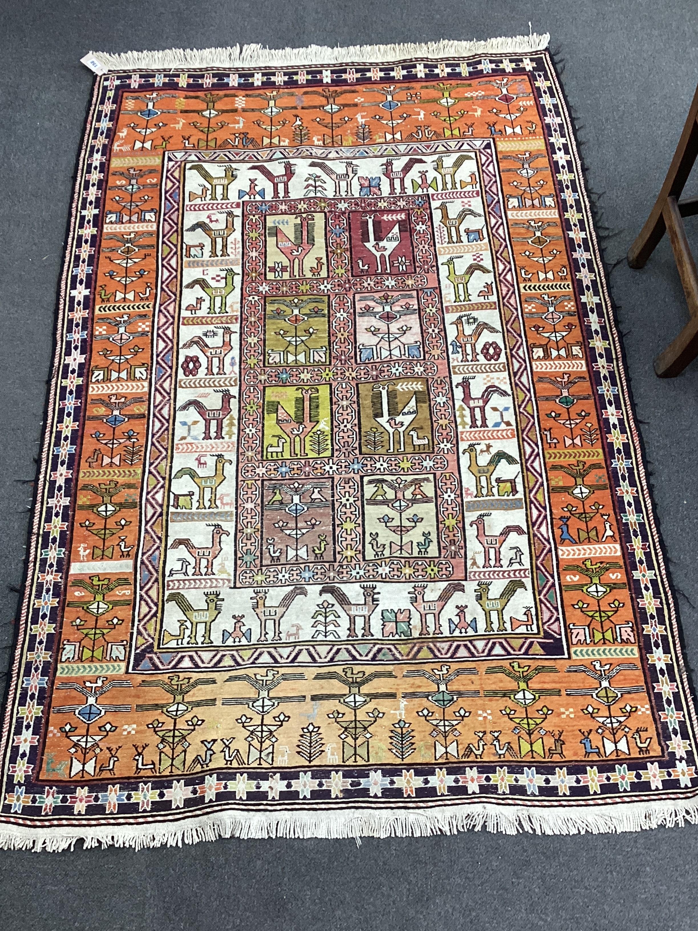 A Sumak polychrome Kilim rug, 184 x 122cm